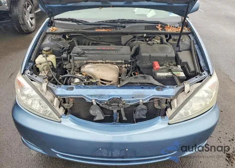 2003 Toyota Camry Le z USA, uszkodzony, nr VIN 4T1BE32K93U228467